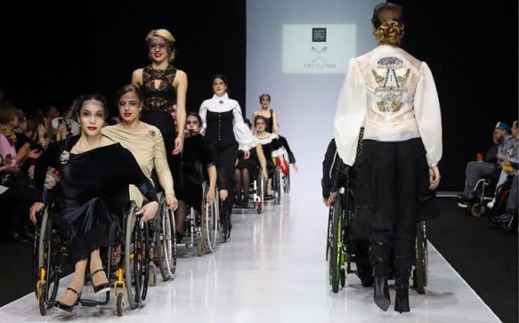 Models in wheelchairs appear in Moscow Fashion Week
